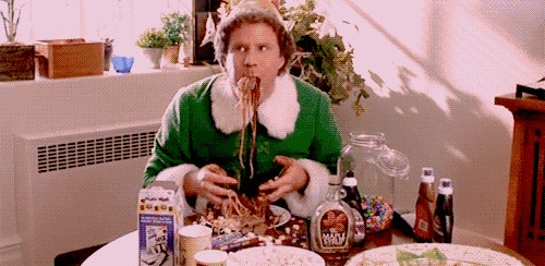 Picture of Will Ferrell in Elf eating candy and pasta