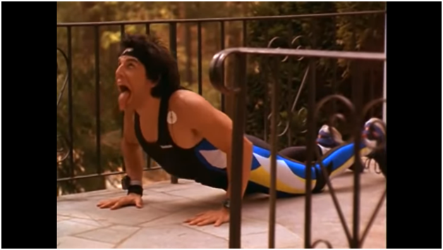 Picture of Ben Stiller in Heavyweights doing yoga and sticking his tongue out