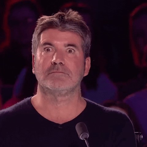 Picture of Simon Cowell with his eyes wide